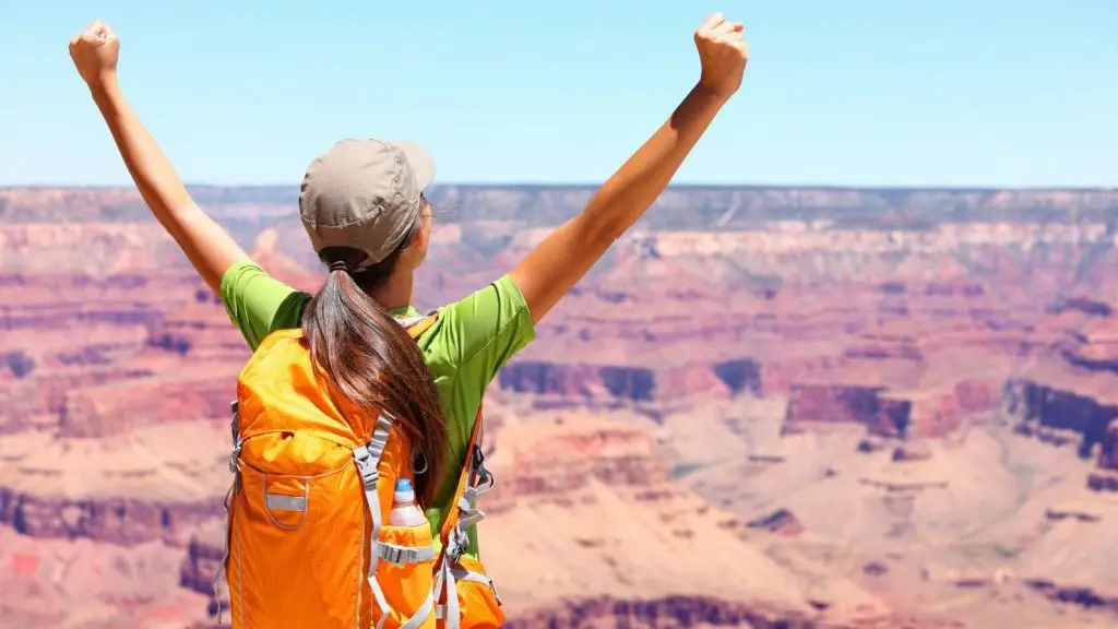 Woman is excited for visiting Grand Canyon