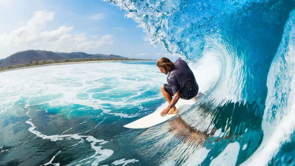 A man surfing in Hawaii