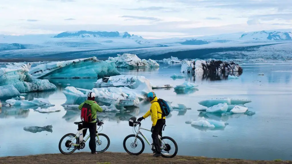 two traveler traveling in Iceland on bikes